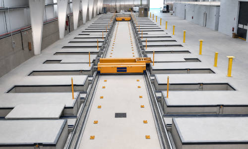 Desarrollo de línea automática para el movimiento y acabado de baños prefabricados destinados al sector residencial de Moldtech